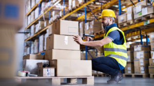 warehouse worker with barcode scanner